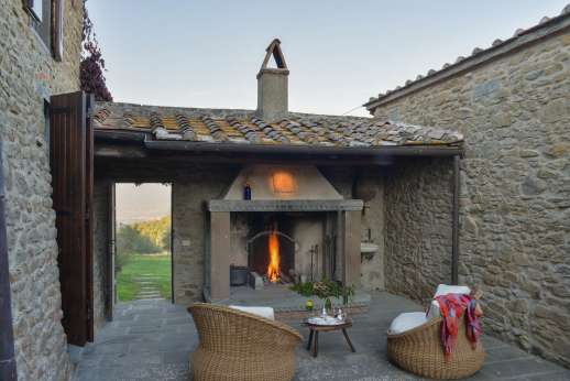 Il Cortile Pratolino (x 15 people) with Staff and Cook - In the courtyard there is a wonderful little nook provides an outdoor sitting area in front of a big stone fireplace