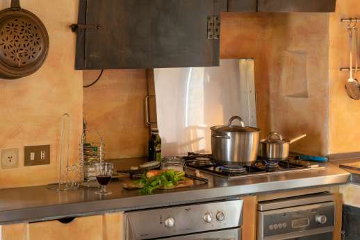 I Ruderi - The modern kitchen is cleverly designed to blend in with the decor.