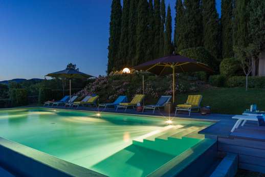 Villa Caprolo - The fully lit pool is perfect for a refreshing evening swim.