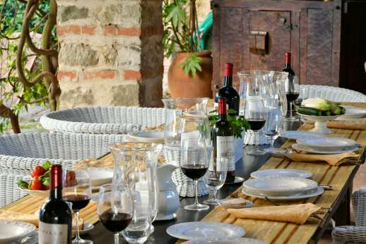 Villa San Martin - The full loggia with dining area to the left and seating to the right