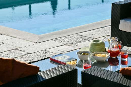 Il Cornello - Pool side shaded lounging area.