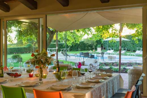 Solomonio - Facing the pool is the summer dining room with glass doors leading out under a shaded terrace, New Wing/Upper Ground Floor