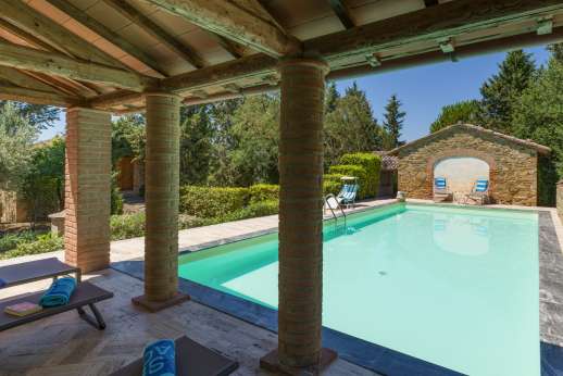 Val Ferrone -  The private swimming pool with travertine paving