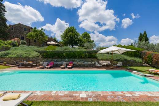 La Sobole - There is a shaded seating area and a bench with cushions running the length of the pool and numerous loungers