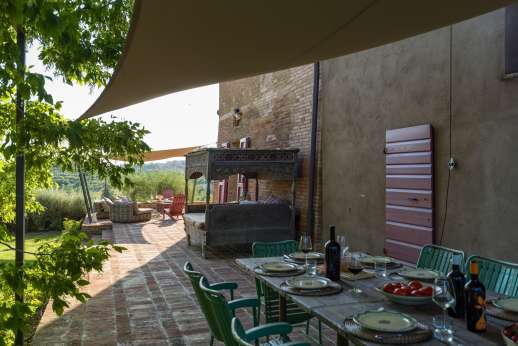 Santa Dieci | 5 Bed Luxury Villa with Pool | Siena Santa Dieci - The dining loggia by the main house.