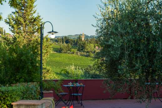 Villa Le Botti - Another of the paved terraces with seating area and again stunning views.