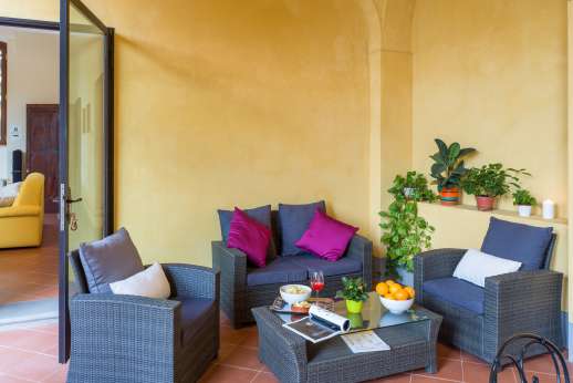 Santa Gelsa - TV room leads into the dining portico