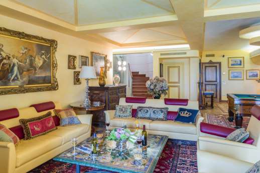 Villa Soele - Main living room with pool table, large TV with English movie channels and doors opening to the covered outdoor dining