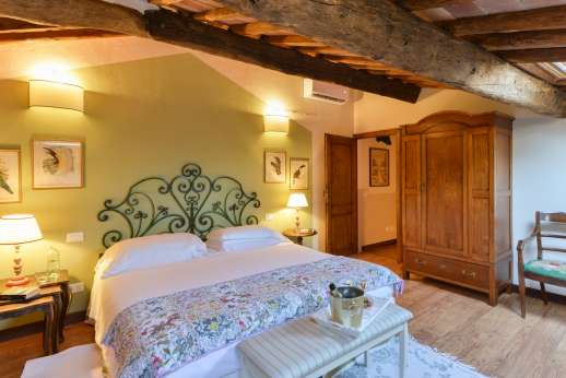 Palazzo Nelle - Attic with a double/twin bed with a small studio and walk-in closet.