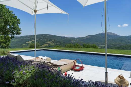 Tra Sanvento - he private swimming pool on the terraced, lawned gardens, offers extensive views of the undulating Umbrian hills.