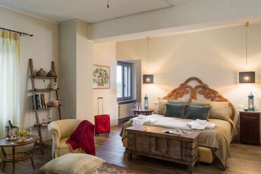 Loliondo - First floor master bedroom with large walk-in closet and en-suite bathroom
