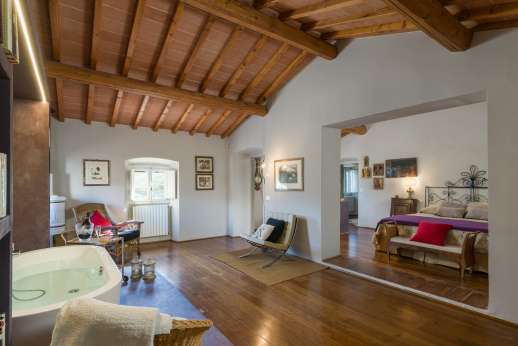Staffed weddings at The Estate of Petroio - View back towards the large and beautiful first floor bedroom