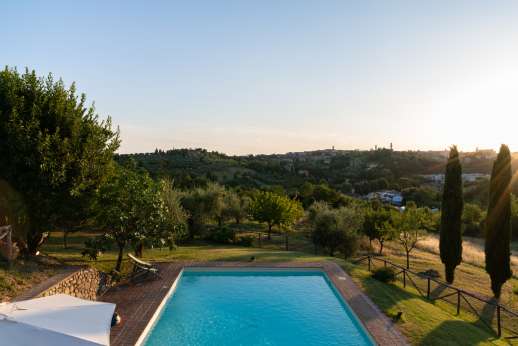 Santa Dieci - The sun setting over Siena