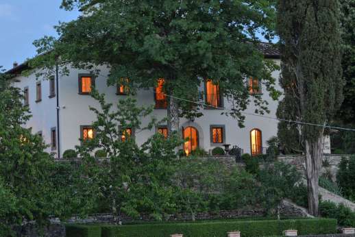 Weddings at Villa Di Masseto - View of the pool terrace at night.