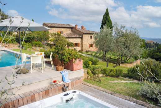 Villa al Monte - The pool and hot tub are set on a paved terrace.