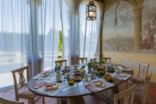 Weddings at Villa Zambonina (x 18 people) - Dining area located on the main façade overlooking over the Italian gardens and leading through to the dining room
