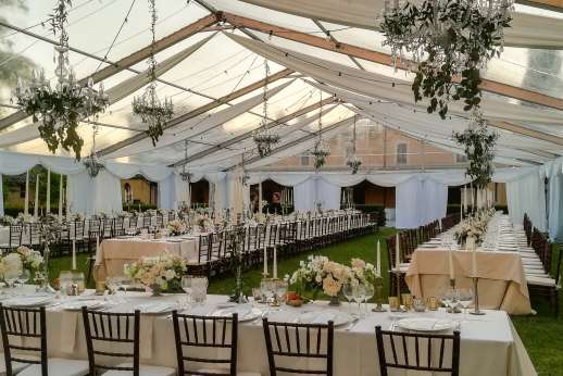 Weddings at Torre della Duchessa - Tables set in the gardens under a large marquee