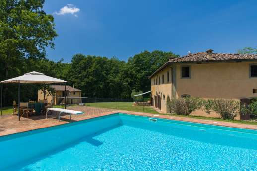 Poggio Ai Grilli - The private fenced swimming pool is set on a slightly higher terrace, about 10 meters from the house