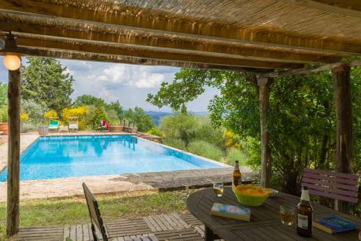 Villa Cignano - Pool side with shaded loggia.