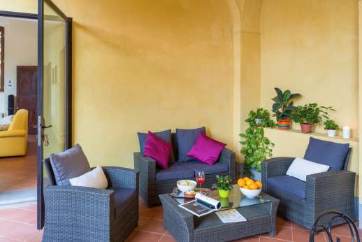 Santa Gelsa - TV room leads into the dining portico