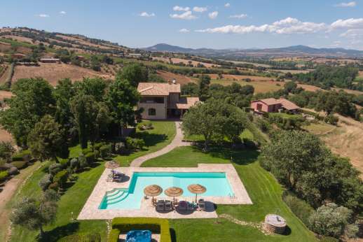 Il Chiesino - he private swimming pool, 7x 12m/22 x 38 feet, is set 30m/yards from the villa with an adjacent above-ground hot tub