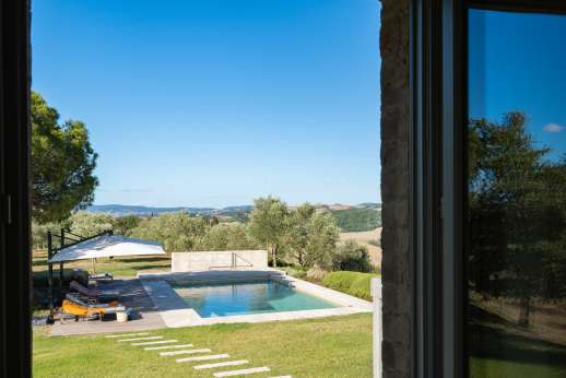 PodereSole -  A few metres across the lawn, the private swimming pool lays in the centre of the garden