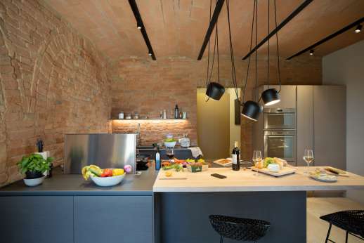 PodereSole - The kitchen consists of state-of-the-art induction cooktop and walk-in pantry with an additional countertop