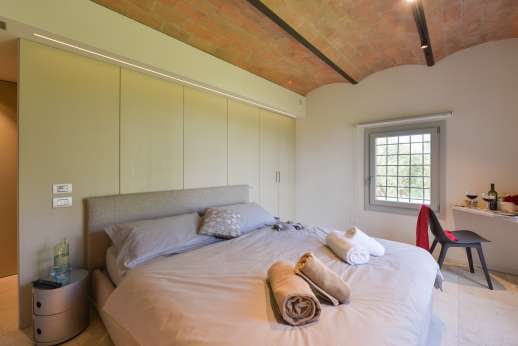 PodereSole - air-conditioned double bedroom with en-suite bathroom