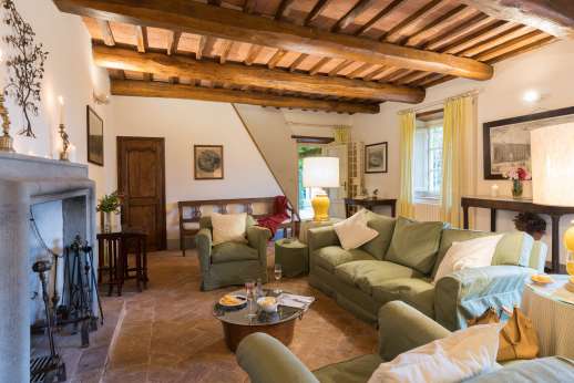 La Gattaiola - Ground floor sitting room with large open fire!