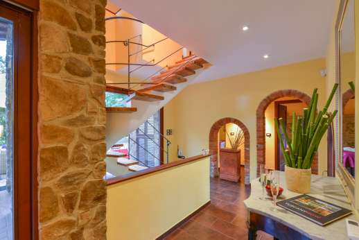 Delpietre- From the ground floor up the floating staircase
