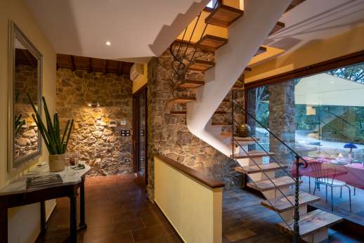 Delpietre - Floor-to-ceiling glass open into a welcoming home