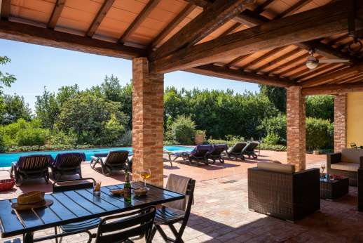 Vecchia Fattoria - A nicely situated pool with an adjacent dining area and summer kitchen.