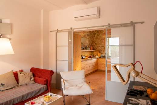 La Casa del Chiu' - TV room through to the kitchen