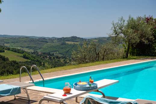 Casalta - The pool area is paved also with shaded loggia for relaxing out of the sun