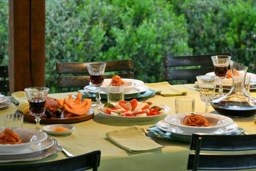 La Piana - Dine under the pergola in the evenings with Siena on the skyline.