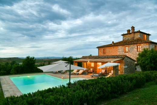 La Piana - The view from the pool with Siena on the sykline.