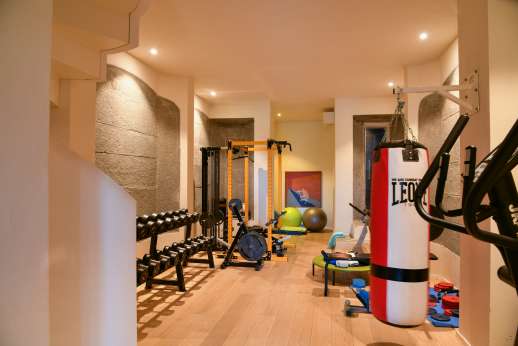 Tenuta Almabrada - Lower level gym and Turkish bath leading to a billiard/games room