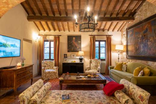 La Piana - Large first floor sitting room with working fireplace in the main house.