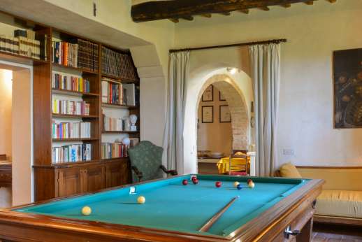 La Piana - The billiards table leading through to the kitchen.