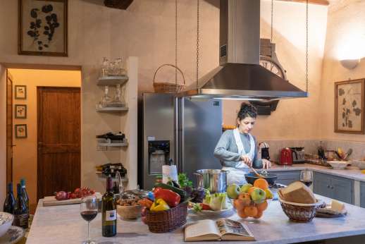 La Piana - Kitchen leading out the the dining pergola.