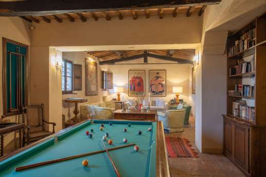 La Piana - The open plan billiards and sitting room leading through to the kitchen.