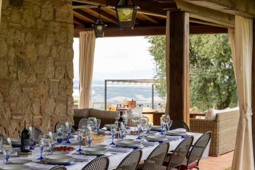 Podere Casalfava - The shaded loggia provides a perfect place for al fresco dining.