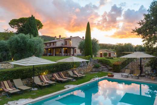 Podere Casalfava - Podere Casalfava from afar looks like everyone’s idea of the perfect stone farmhouse.