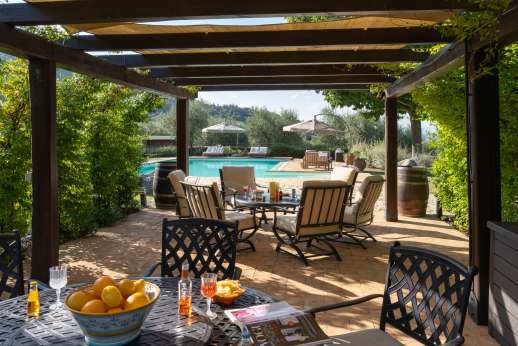 Cipresso Dorato - The private swimming pool with a large shaded seating area