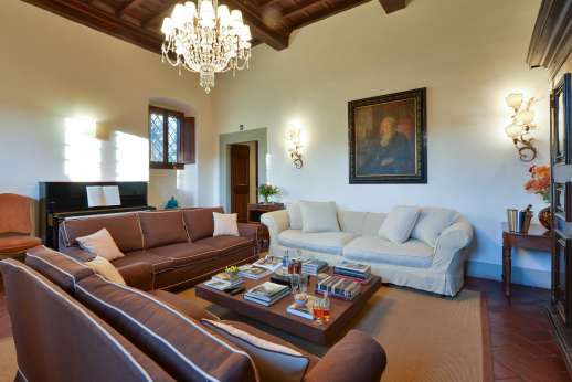 Villa Di Masseto - First floor up 21 stone steps to a sitting room with fireplace.
