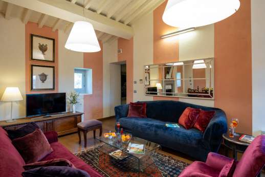I Giullari - Another view of the east wing first floor dining area in the open plan sitting room.