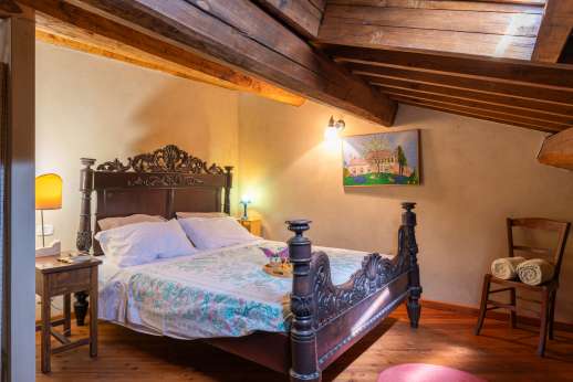 Santi Terzi (x 14 people) with Staff and Cook - La Soffitta apartment  double bedrooms with a portable fan