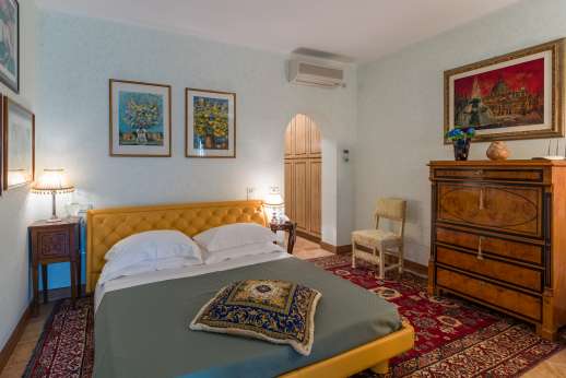 Lower ground floor double bedroom and a door leading onto the garden
