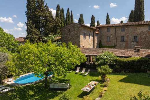 Villa San Martin - The walled and gated garden with well kept lawns gently slopes down to the private salt water swimming pool