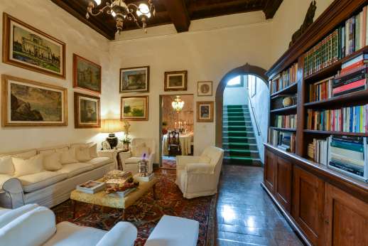 Villa San Martin - Sitting room with view through to another sitting room with TV